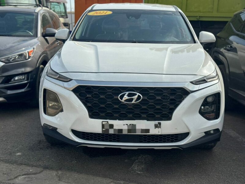 Location de véhicules Hyundai Santafe blanche